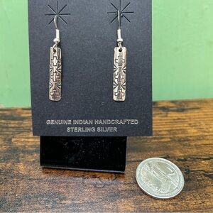 Genuine Native and stamped sterling earrings.